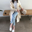 Fashion double-breasted loose and slim long trench coat